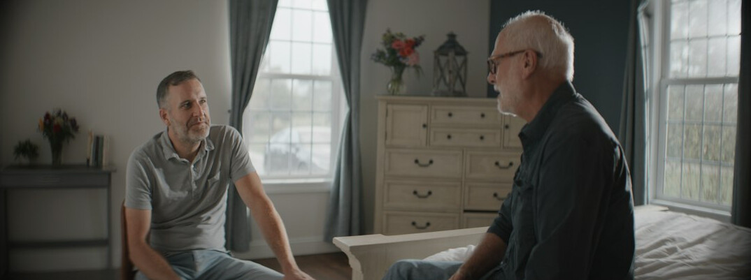 Mentor guiding a younger person in conversation