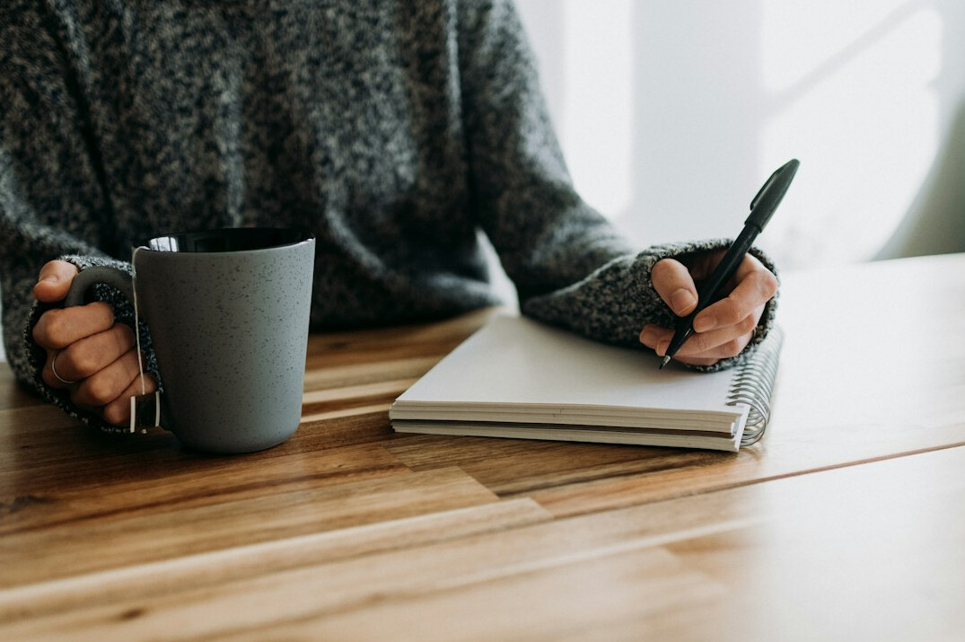 writing in notebook
