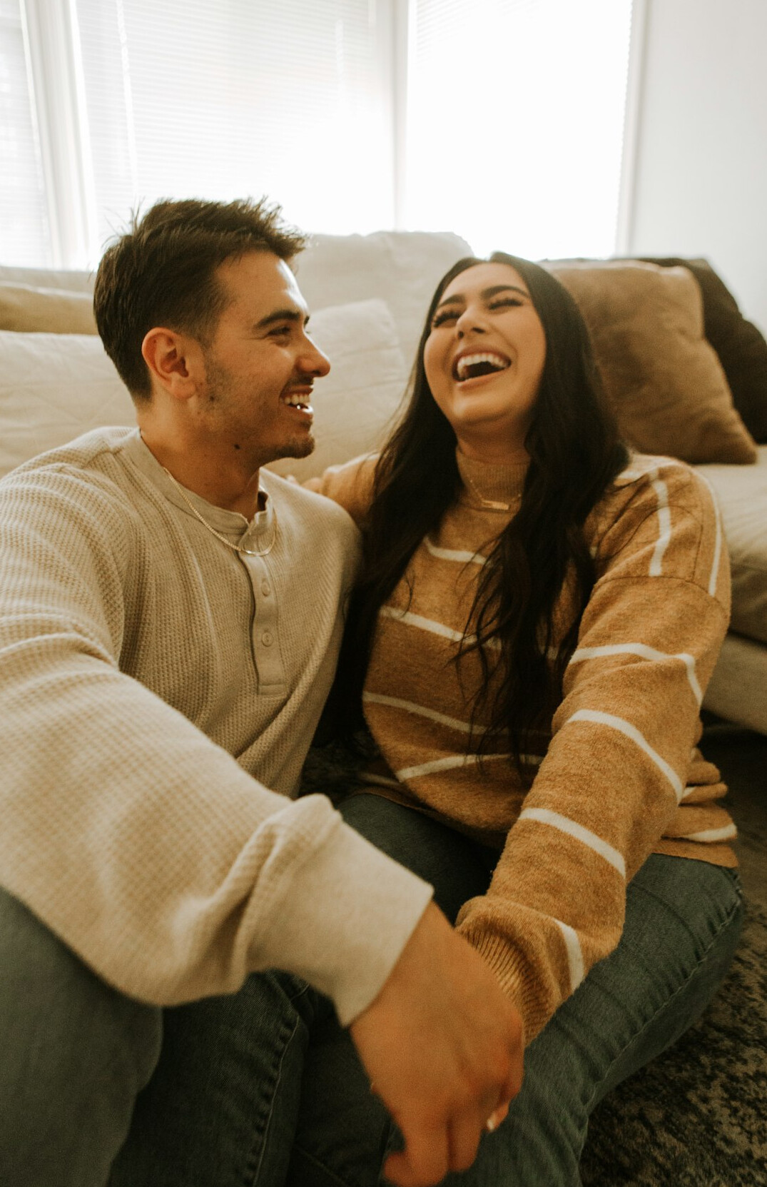 couple talking on couch