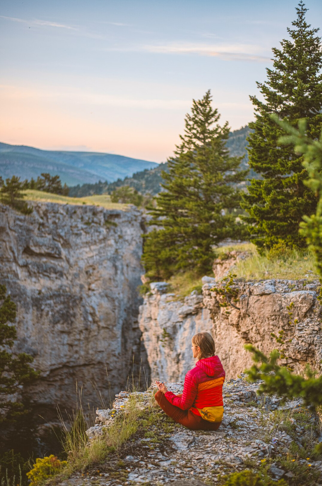 person meditating in nature
