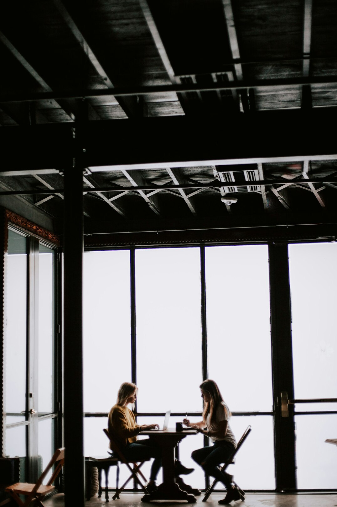 people having conversation in meeting