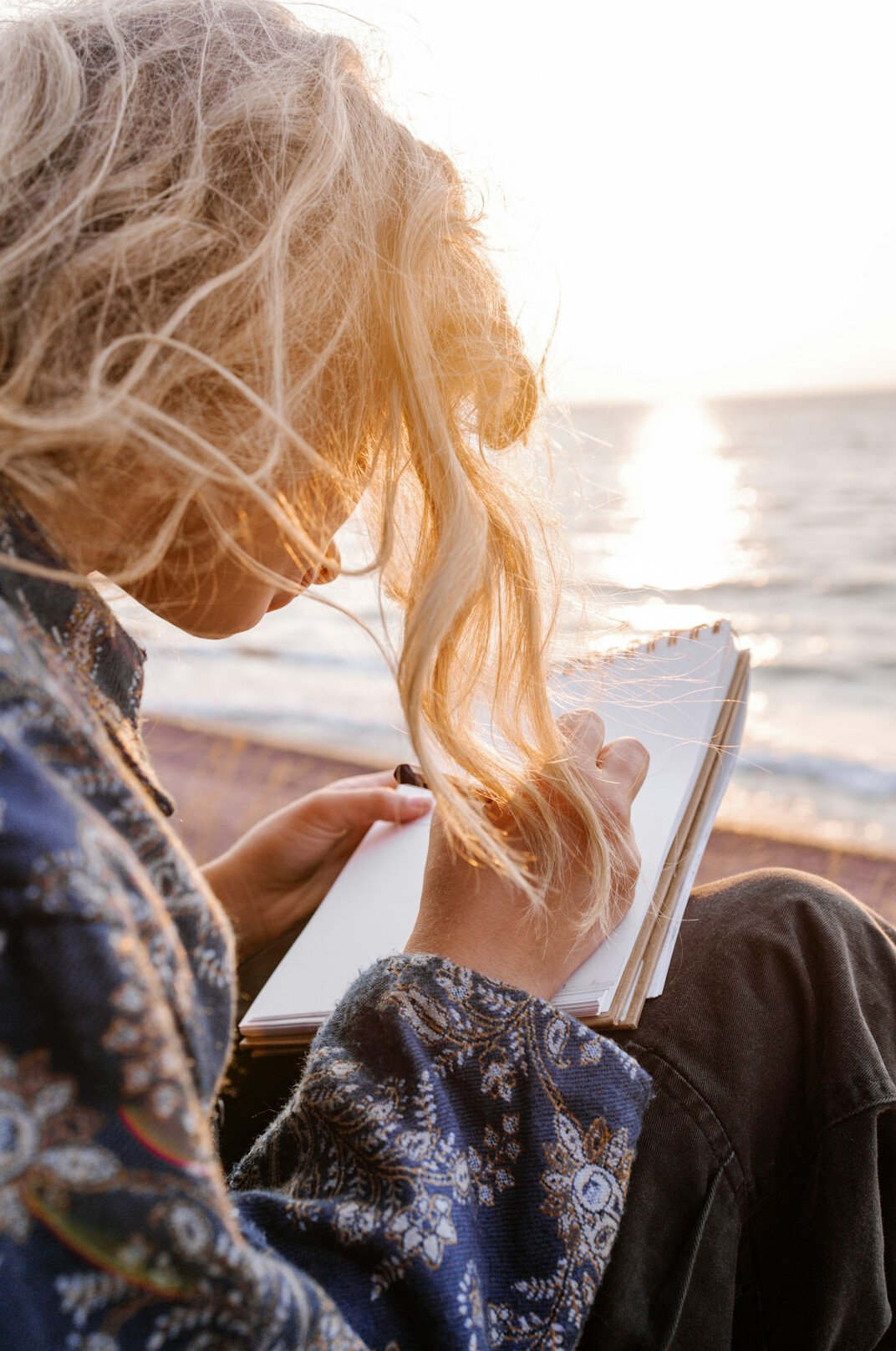 Woman writing in a journal