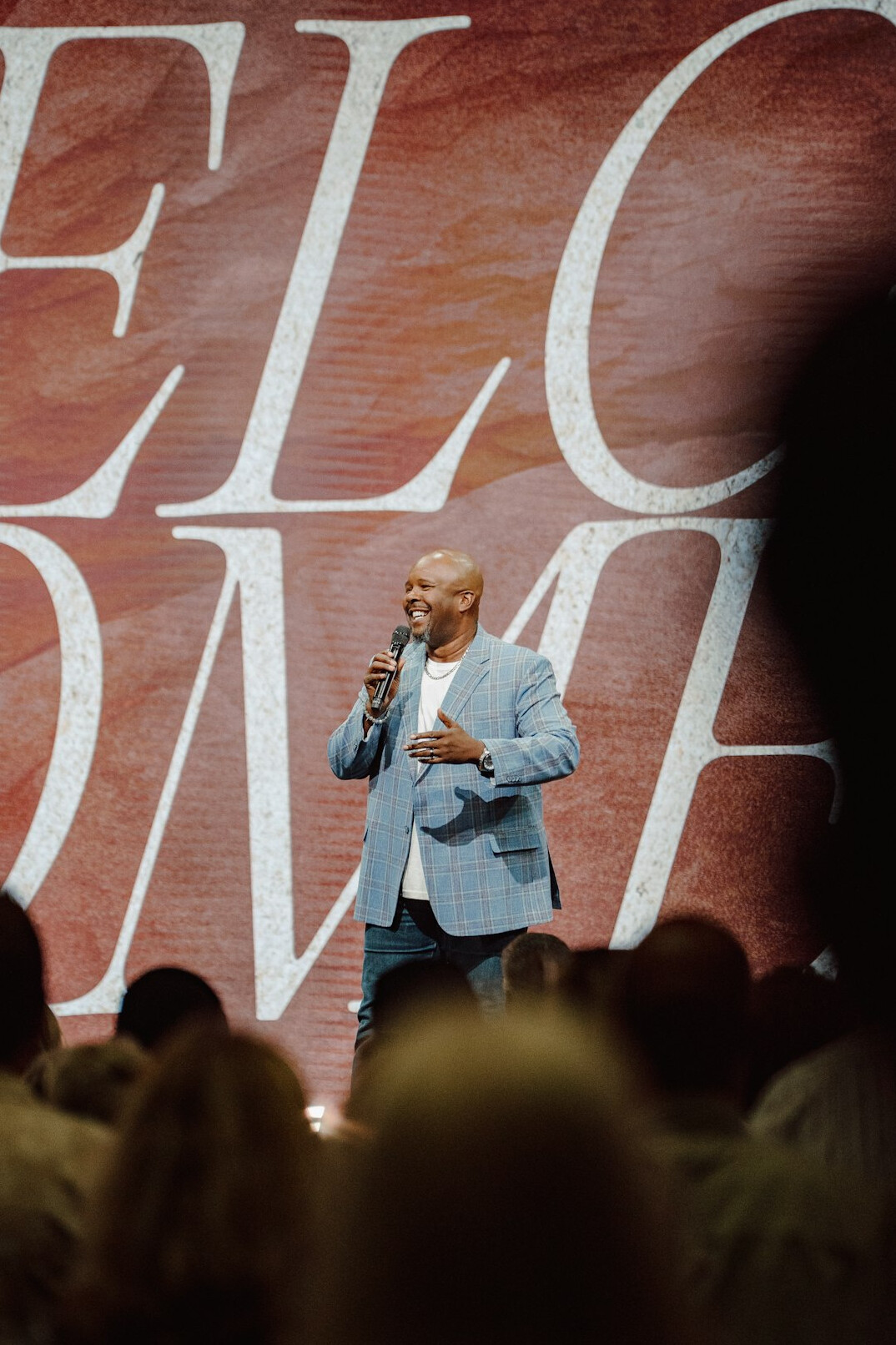Man speaking confidently to an audience